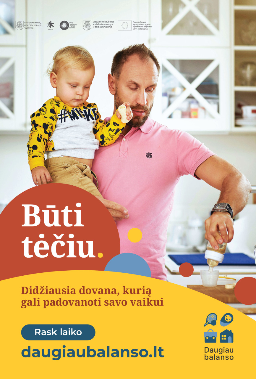 Tėtis su mažu vaiku ir užrašas, reklamuojantis svetainę daugiaubalanso.lt